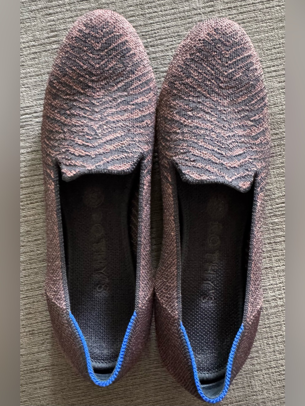 Rothy's The Loafer shoes in the Twilight Metallic Zebra pattern.